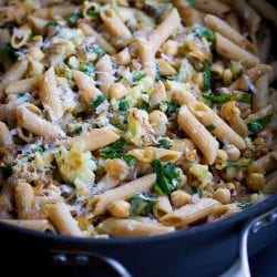 One of the best pasta dishes I've eaten in a long time! This roasted cauliflower pasta is flavored with caramelized onions, spinach and hazelnuts. Mostly pantry staples! 313 calories and 6 Weight Watchers SP | Vegetarian | Recipes | Healthy | Easy | How to Make #vegetarianpasta #roastedcauliflower #vegetarianrecipes #cauliflowerrecipes #pantrystaples #weightwatchers